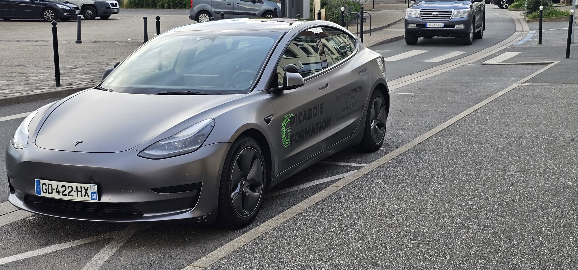 Tesla Model 3 Picardie Formation — passerelle taxi vers VTC